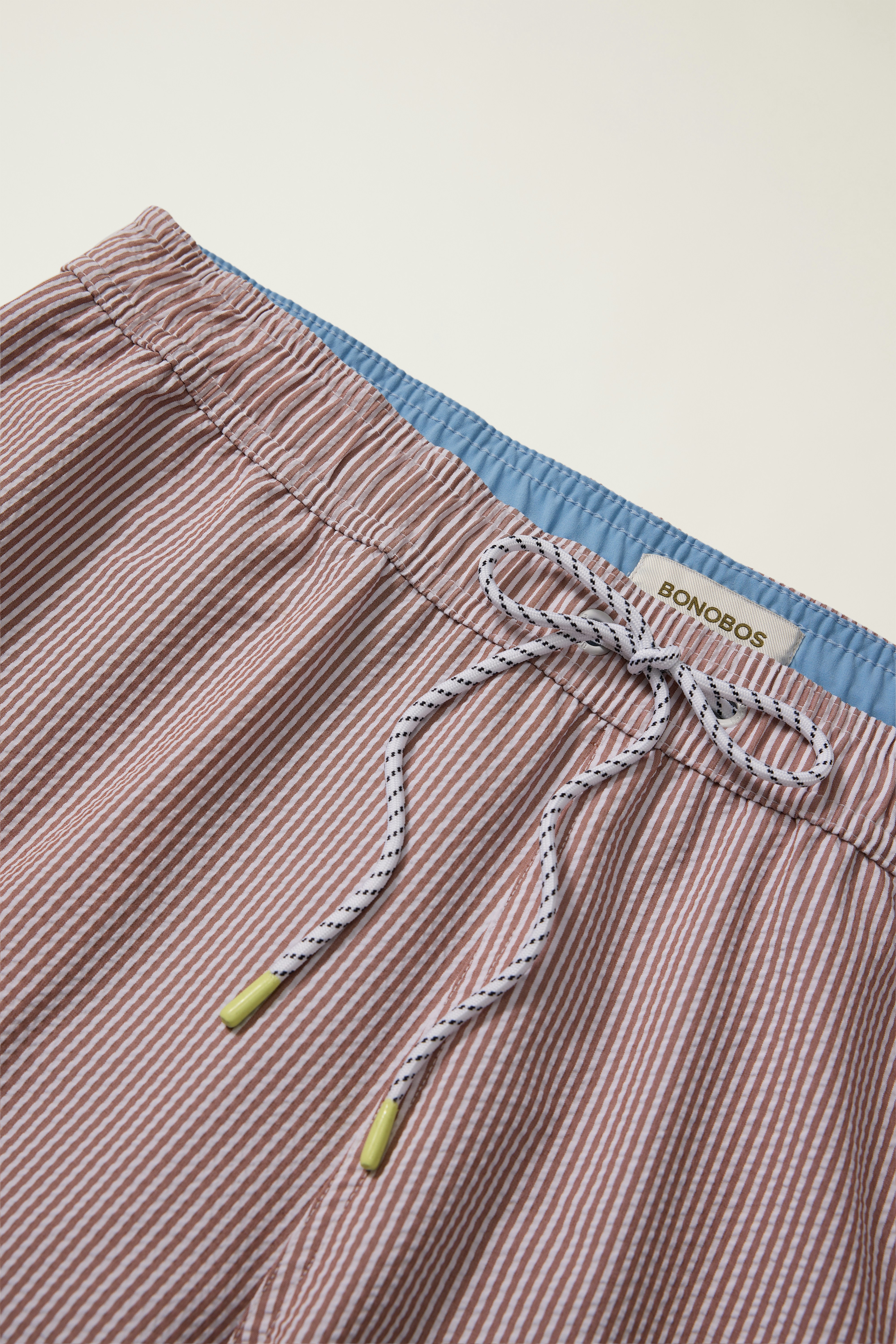 Riviera Swim Trunks tan and white seersucker
